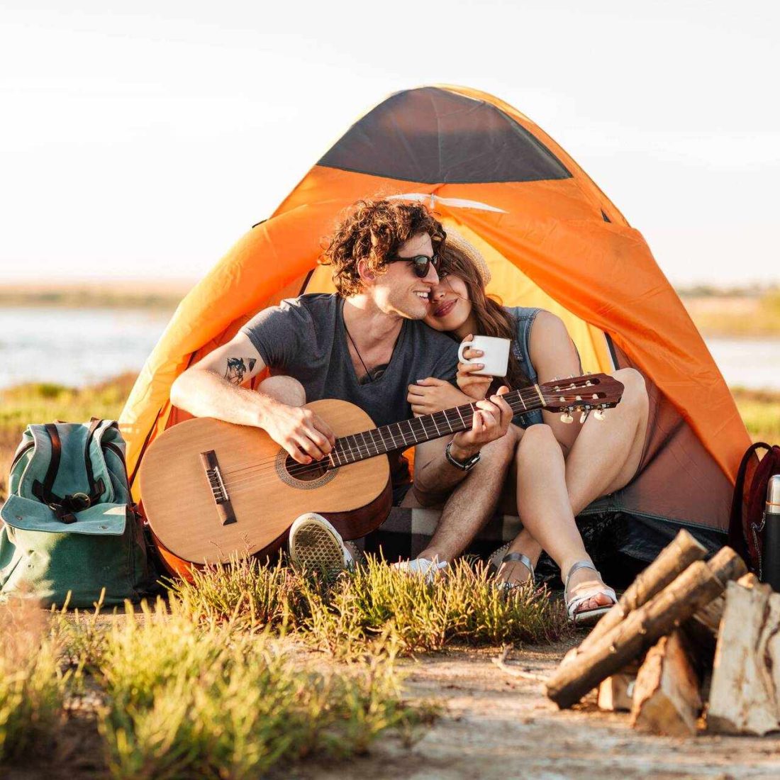 portrait-of-a-man-playing-guitar-for-his-girlfrien-PSKYV3C-1.jpg